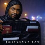 Waterproof emergency document bag with labeled features like IPX7 rating and sealed zipper, showcasing organized interior with folders.